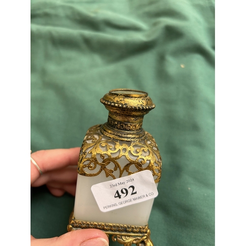 492 - Lidded operline perfume bottle, gilded to base and top with original stopper