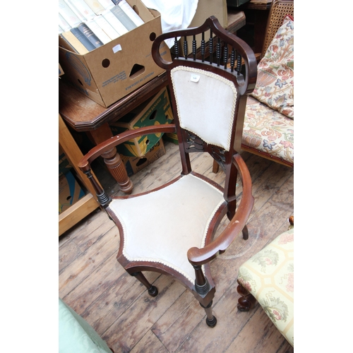 640 - Arts and Crafts style corner chair, curved arms, details back with inset fabrics