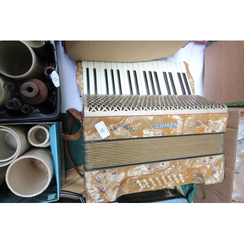 12 - Mother of Pearl style Accordian with the name 'Carmen'