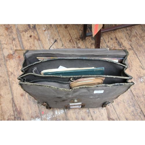 26 - Vintage Air Traffic Controllers bag with a variety of maps, boxes and books and other items