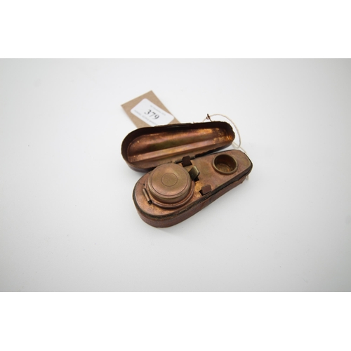 379 - Miniature travelling ink well in leather case shaped as a violin case