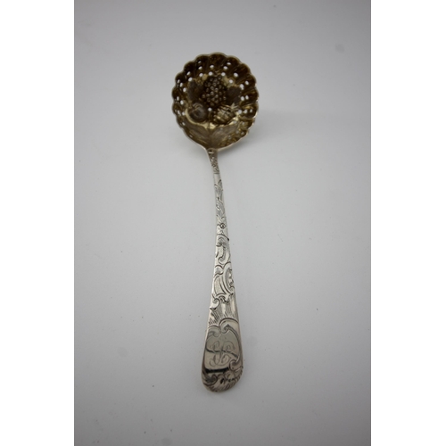 418 - Silver sifter ladle, ornate design (London 1789)