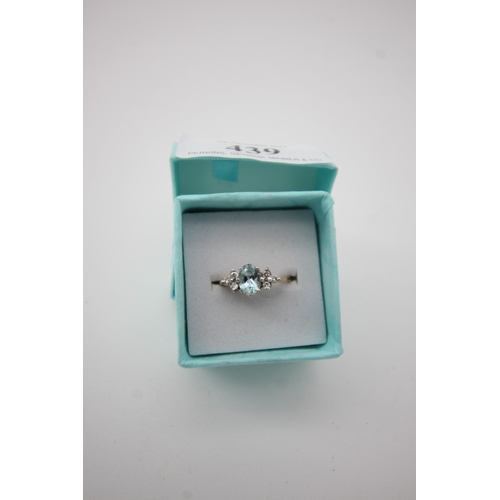 439 - Aquamarine and diamond cluster (size O)