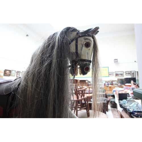 594 - Superb Victorian large rocking horse with leather seat, horse hair mane and tail, all in good condit... 