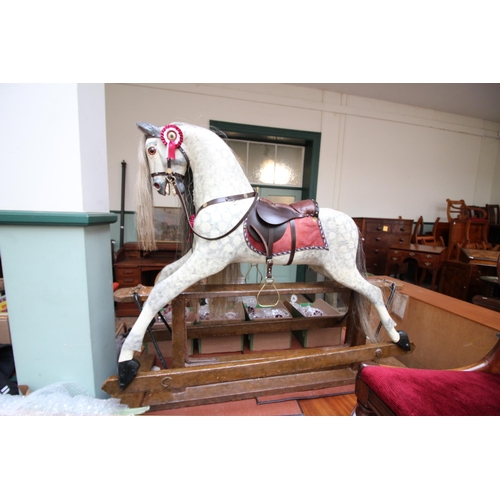 594 - Superb Victorian large rocking horse with leather seat, horse hair mane and tail, all in good condit... 