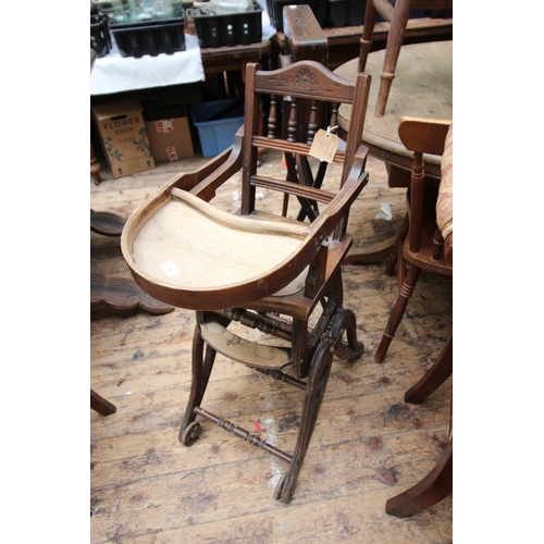 621 - Victorian child's high chair on wheels with tray, folding ratchet legs