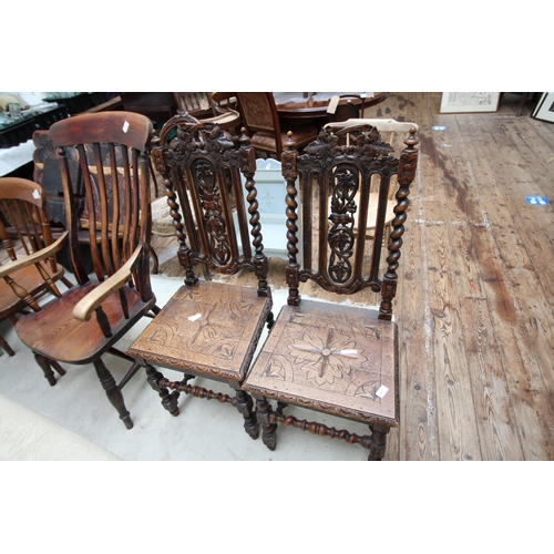 627 - Pair of nice early oak carved dining chairs, heavily carved backs and seating with barley corn twist... 