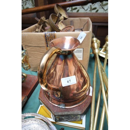 67 - Large copper jug on wood base with commemoration plaques, together with a hard backed book entitled ... 