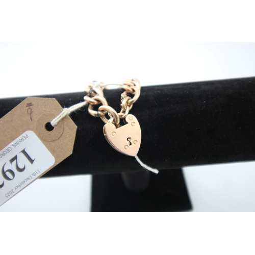 1292 - 9ct gold coil bracelet with heart locket