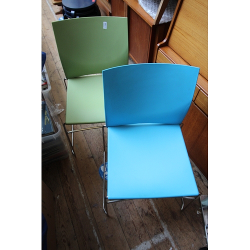 1344 - Pair of British stacking chairs, 1 blue and 1 green entitled 'Connection' 2013