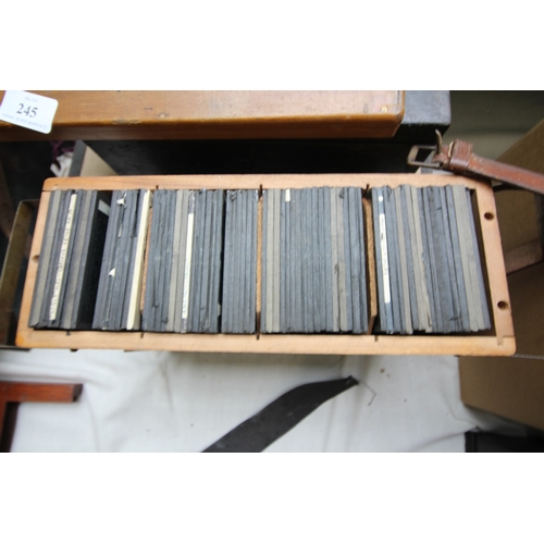 245 - 2 boxes of Magic Lantern slides, 1 entitled The Scily Isles the other Cornwall and various ships and... 