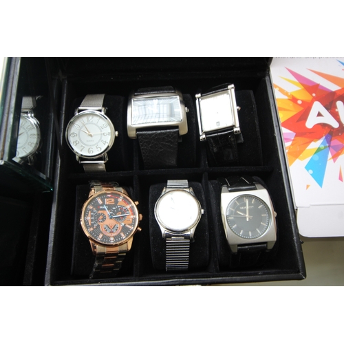 280 - Display box containing 6 designer watches , modern design