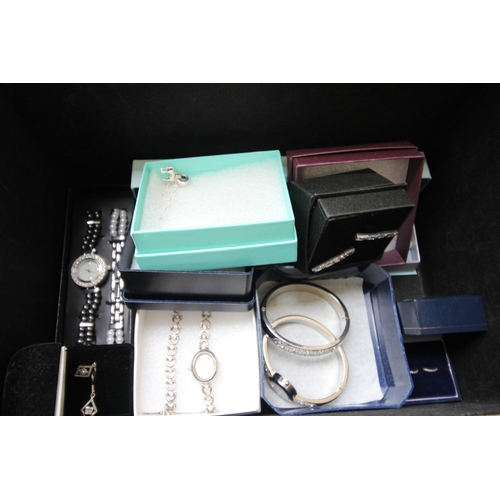 281 - Ladies display casket containing arrangement of modern jewelry, bangles, necklaces, watches etc