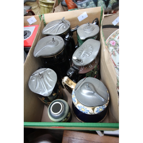 9 - Collection of coffee jugs with metal lids