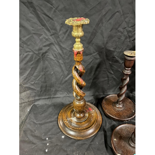 36 - Two Pairs of Barley Twist Oak Candlesticks (one with brass mounts) (Largest 40cm High)