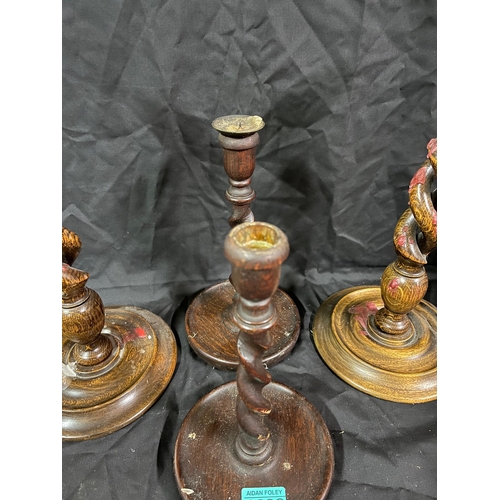 36 - Two Pairs of Barley Twist Oak Candlesticks (one with brass mounts) (Largest 40cm High)