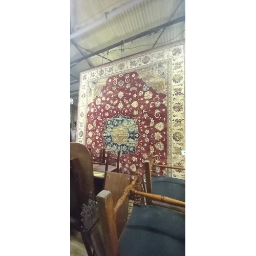 17 - Large Red and Ivory Ground with Central Medallion Design Carpet, machine made (3m x 3m) worn