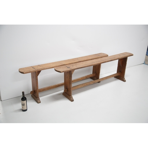 14 - A Pair of Pitch Pine Antique Pig Benches with Cross Stretch Supports (183 cm W x 56 cm H x 30 cm D)