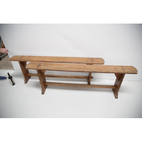 14 - A Pair of Pitch Pine Antique Pig Benches with Cross Stretch Supports (183 cm W x 56 cm H x 30 cm D)