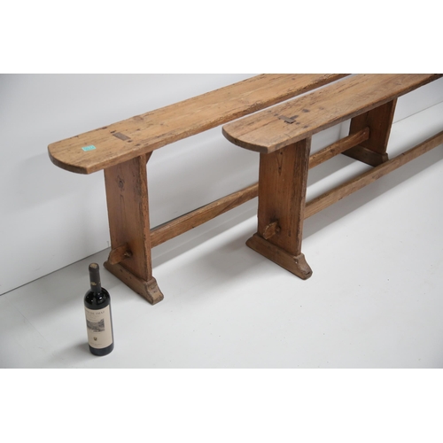 14 - A Pair of Pitch Pine Antique Pig Benches with Cross Stretch Supports (183 cm W x 56 cm H x 30 cm D)