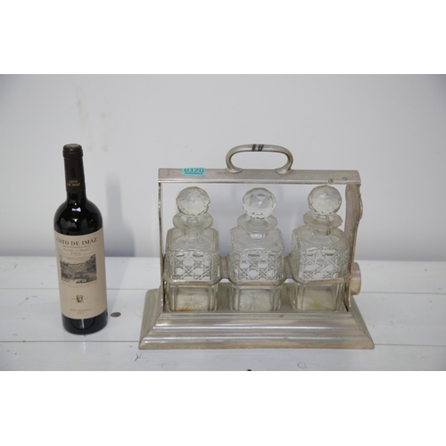 170 - Silver Plated Tantalus, Cut Glass Decanters (damage and no key) (38 cm W x 32 cm H x 16 cm H)