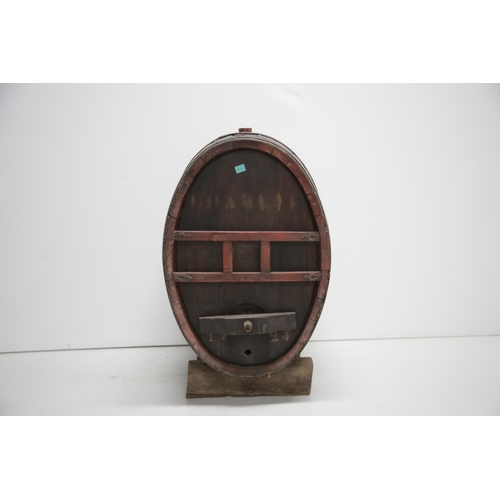 22 - Fine Oak Oval Shaped Metal Bound Barrell on Stand (62 cm W x 110 cm H x 80 cm D)