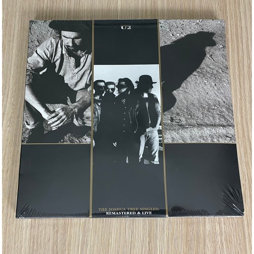 556A - U2 - The Joshua Tree Singles Remastered & Live - Fan Club Vinyl Set - New/Sealed. 
4 x 10