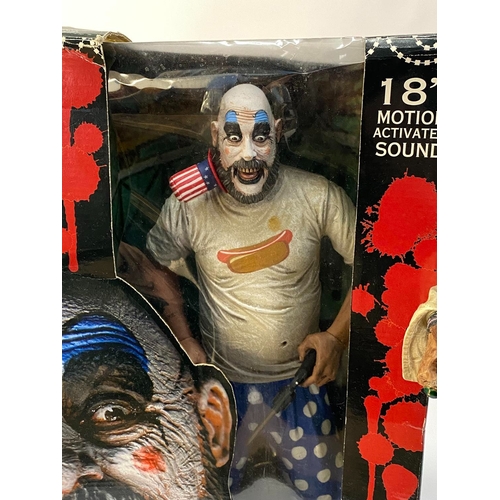 31 - A boxed figure of Captain Spaulding and a figure of Captain Jack Sparrow