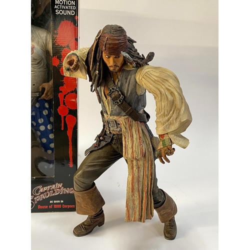 31 - A boxed figure of Captain Spaulding and a figure of Captain Jack Sparrow