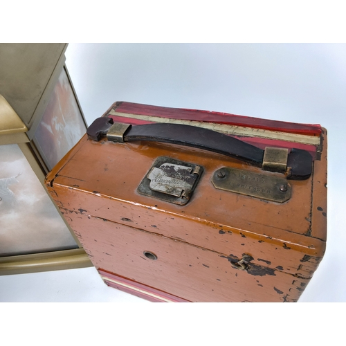 19 - Two Automatic Timing Clock Co. Limited pigeon clocks and a lamp