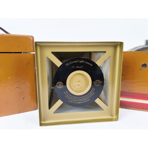 19 - Two Automatic Timing Clock Co. Limited pigeon clocks and a lamp