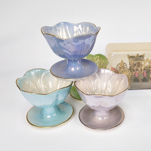 24 - A set of Maling Sundae dishes and a model of a Silver Jubilee 1977 Golden Carriage