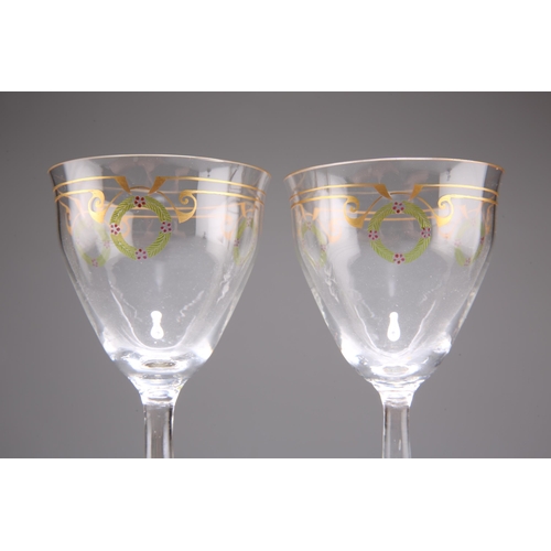 21 - A PAIR OF GERMAN ART NOUVEAU THERESIENTHAL JUGENDSTIL HOCK GLASSES, CIRCA 1905, the clear glass ogee... 