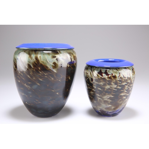 26 - TWO WILL SHAKSPEARE STUDIO GLASS VASES, each of inverted ovoid form with blue rims and marbled bodie... 