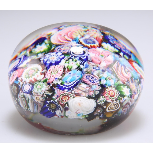 34 - A SIGNED CLICHY CLOSE-PACKED MILLEFIORI PAPERWEIGHT, CIRCA 1850, inset with a variety of brightly co... 