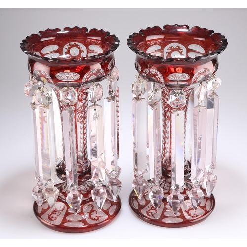 37 - A PAIR OF BOHEMIAN GLASS LUSTRES, LATE 19TH CENTURY, of typical form with red flashing cut through w... 