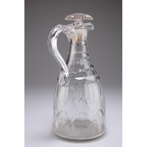 40 - A GEORGIAN CUT-GLASS CLARET JUG, with facet-cut decoration and loop handle. 26.5cm high