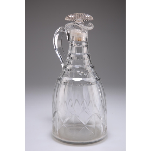 40 - A GEORGIAN CUT-GLASS CLARET JUG, with facet-cut decoration and loop handle. 26.5cm high