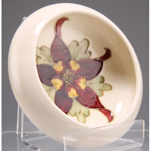 59 - A MOORCROFT POTTERY SMALL BOWL, circular, tubelined and hand-painted with Columbine, impressed 'MOOR... 