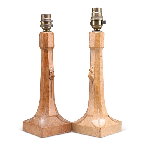 733 - ROBERT THOMPSON, TWO MOUSEMAN OAK TABLE LAMPS, each with octagonal tapering stem and square base, ca... 