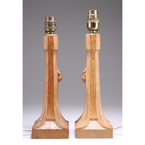 733 - ROBERT THOMPSON, TWO MOUSEMAN OAK TABLE LAMPS, each with octagonal tapering stem and square base, ca... 