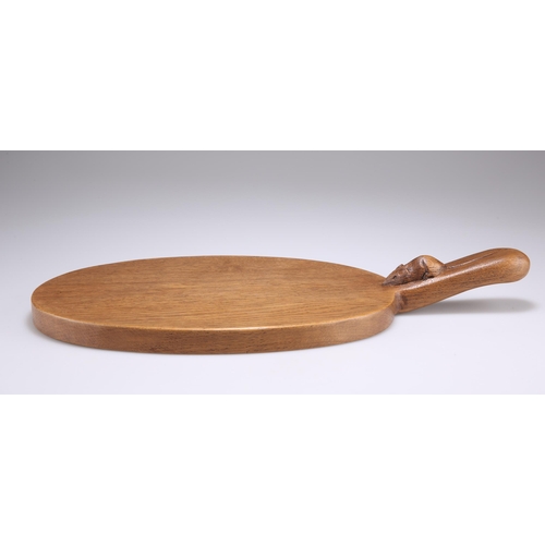 736 - ROBERT THOMPSON, A MOUSEMAN OAK CHEESEBOARD, adzed oval form with carved mouse signature to the hand... 