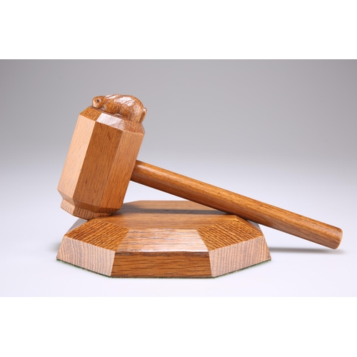 738 - PETER HEAP, A RABBITMAN OAK GAVEL AND BLOCK, CIRCA 1970S, the gavel with octagonal head and carved r... 