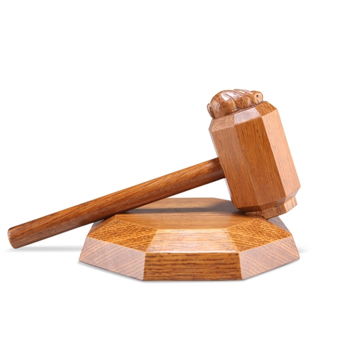 738 - PETER HEAP, A RABBITMAN OAK GAVEL AND BLOCK, CIRCA 1970S, the gavel with octagonal head and carved r... 