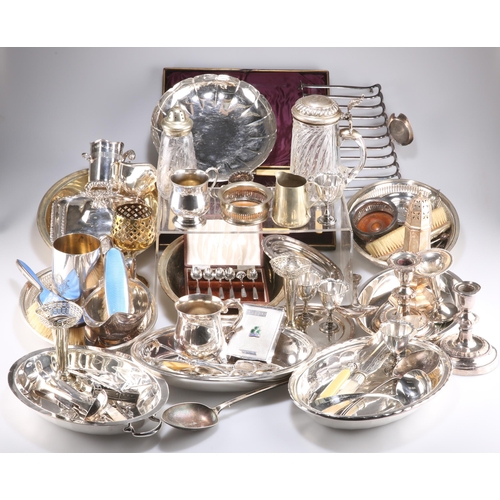 1003 - A LARGE COLLECTION OF SILVER-PLATE, including enamel-backed dressing table brush, sugar caster, sauc... 