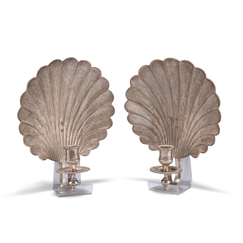 1007 - A PAIR OF 18TH CENTURY STYLE SILVER-PLATED SHELL-FORM WALL SCONCES, each with reel-form candlecup. 2... 