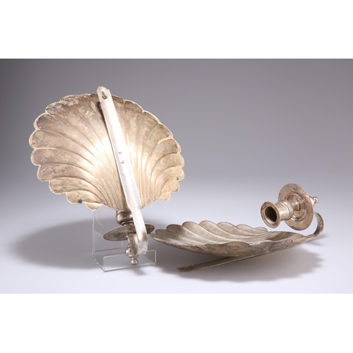 1007 - A PAIR OF 18TH CENTURY STYLE SILVER-PLATED SHELL-FORM WALL SCONCES, each with reel-form candlecup. 2... 