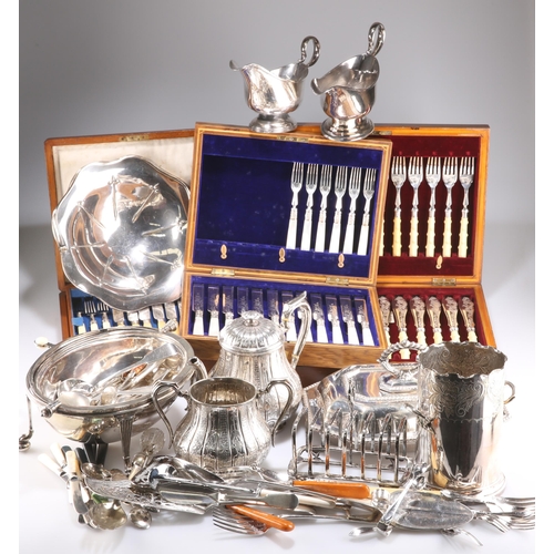 1026 - A LARGE COLLECTION OF SILVER-PLATE, including boxed flatware, breakfast warmer, toast rack, sauce bo... 