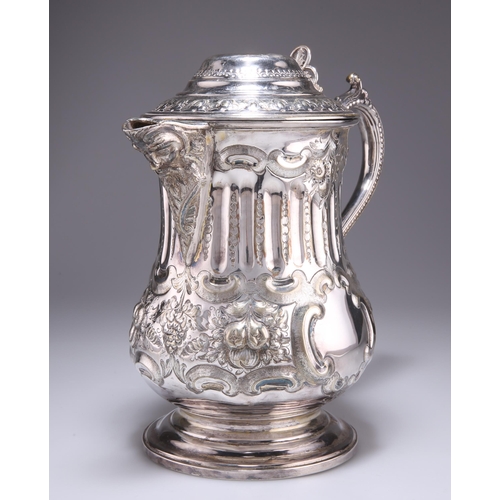 1027 - A LARGE 19TH CENTURY SILVER-PLATED FLAGON, with mask-form spout and beaded S-scroll handle, engraved... 