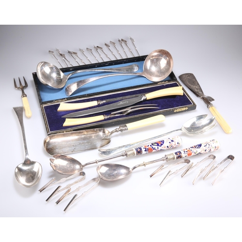 1037 - A GROUP OF PLATED WARES, including twelve pairs of asparagus servers, soup ladle, carving set, crumb... 